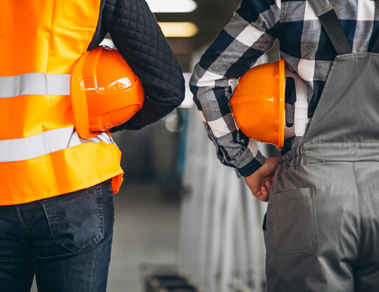 Two colleagues at a factory